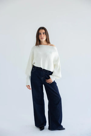 Ivory off-shoulder pullover with dark wide-leg jeans - full length