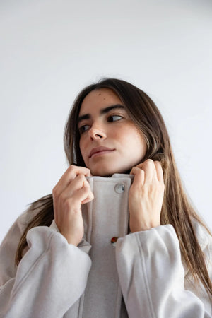 Close-up of the high funnel neck and snap buttons