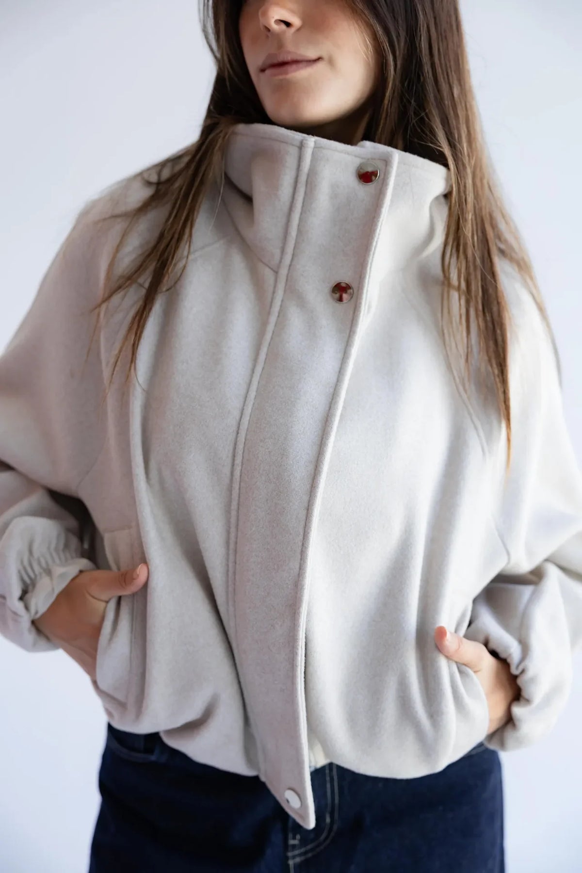 Detail of the front zip, pockets and brushed fabric