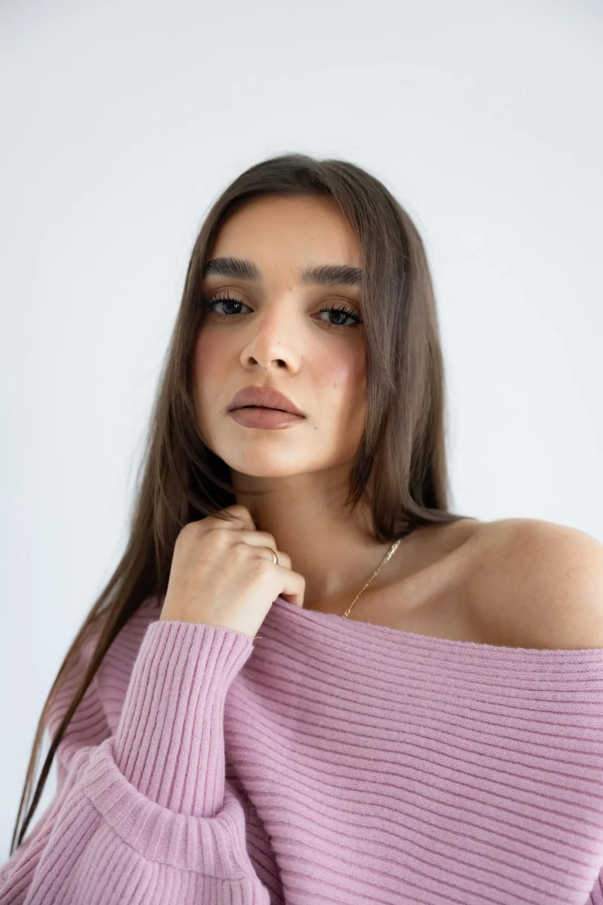 Close-up of the off-shoulder neckline and rib knit